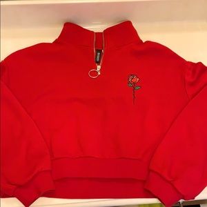 red cropped half zip jacket